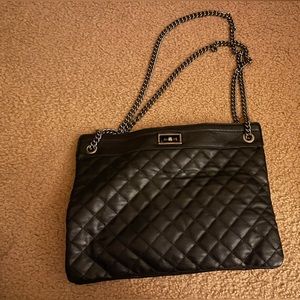 Cute black faux leather shoulder bag.